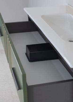 Mobile da bagno sospeso in legno con due cassetti verde pastello con righe dorate